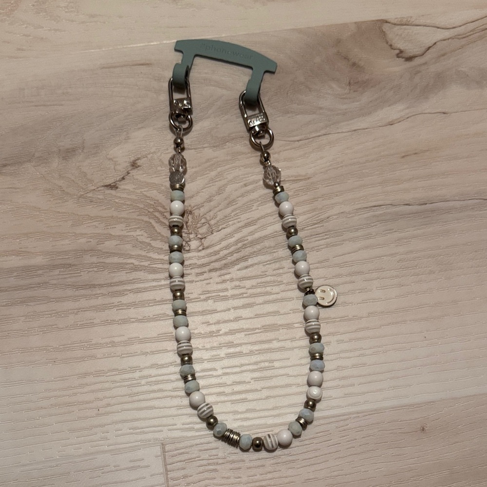 The CAEP beaded phone wristlet